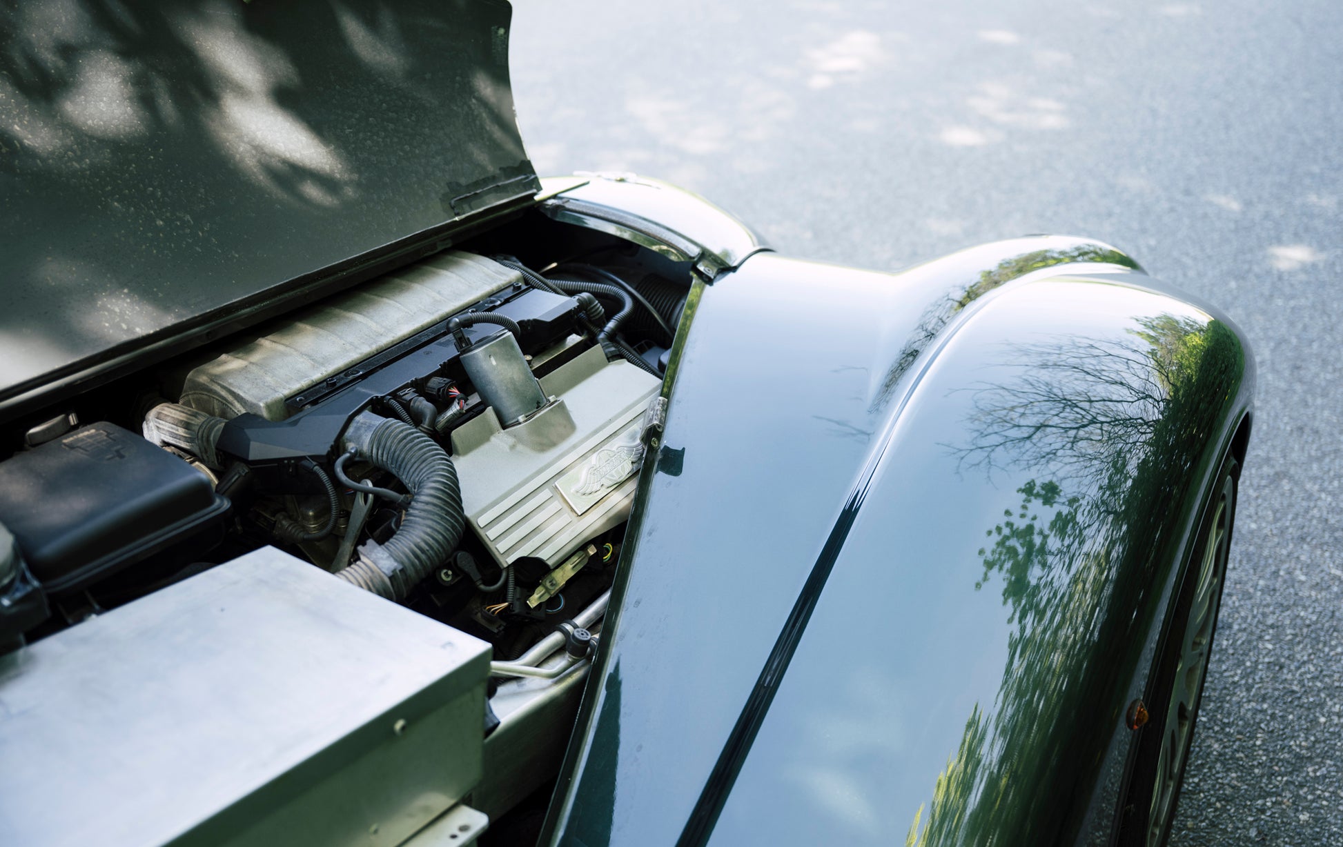Open engine compartment. 2005 Morgan Aero 8.