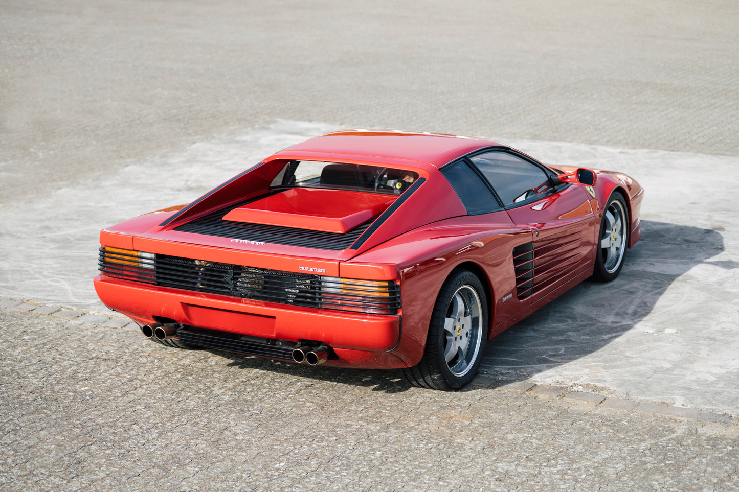 Aggressive looking rear end. 1991 Ferrari Testarossa.
