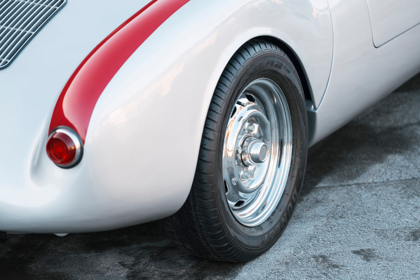 Wheel cap closeup. 1955 Beck 550 Spyder classic car.