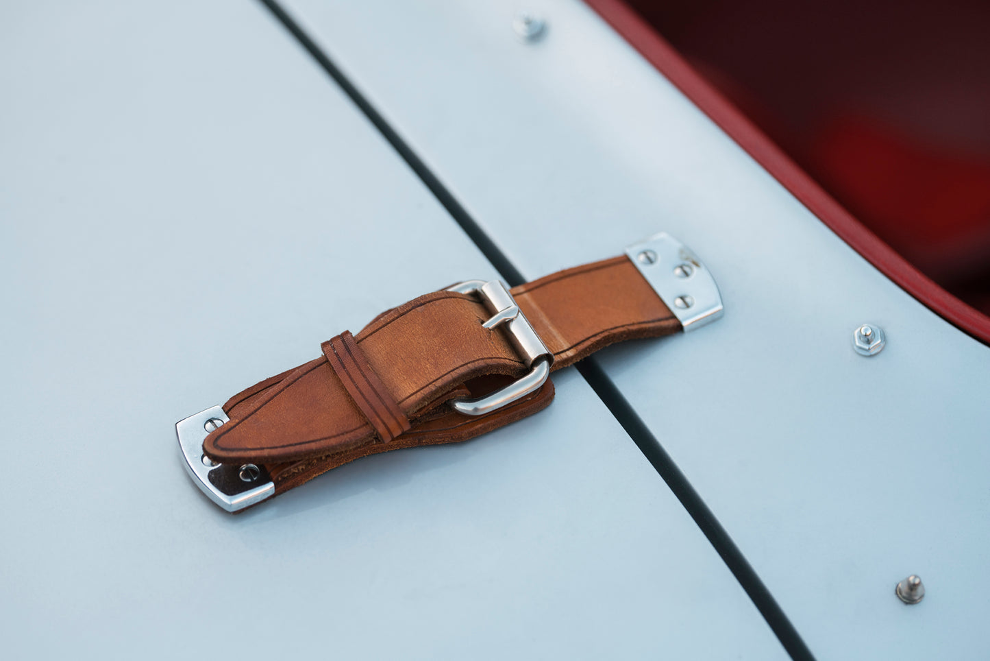 Leather strap detail. 1955 Beck 550 Spyder for sale.
