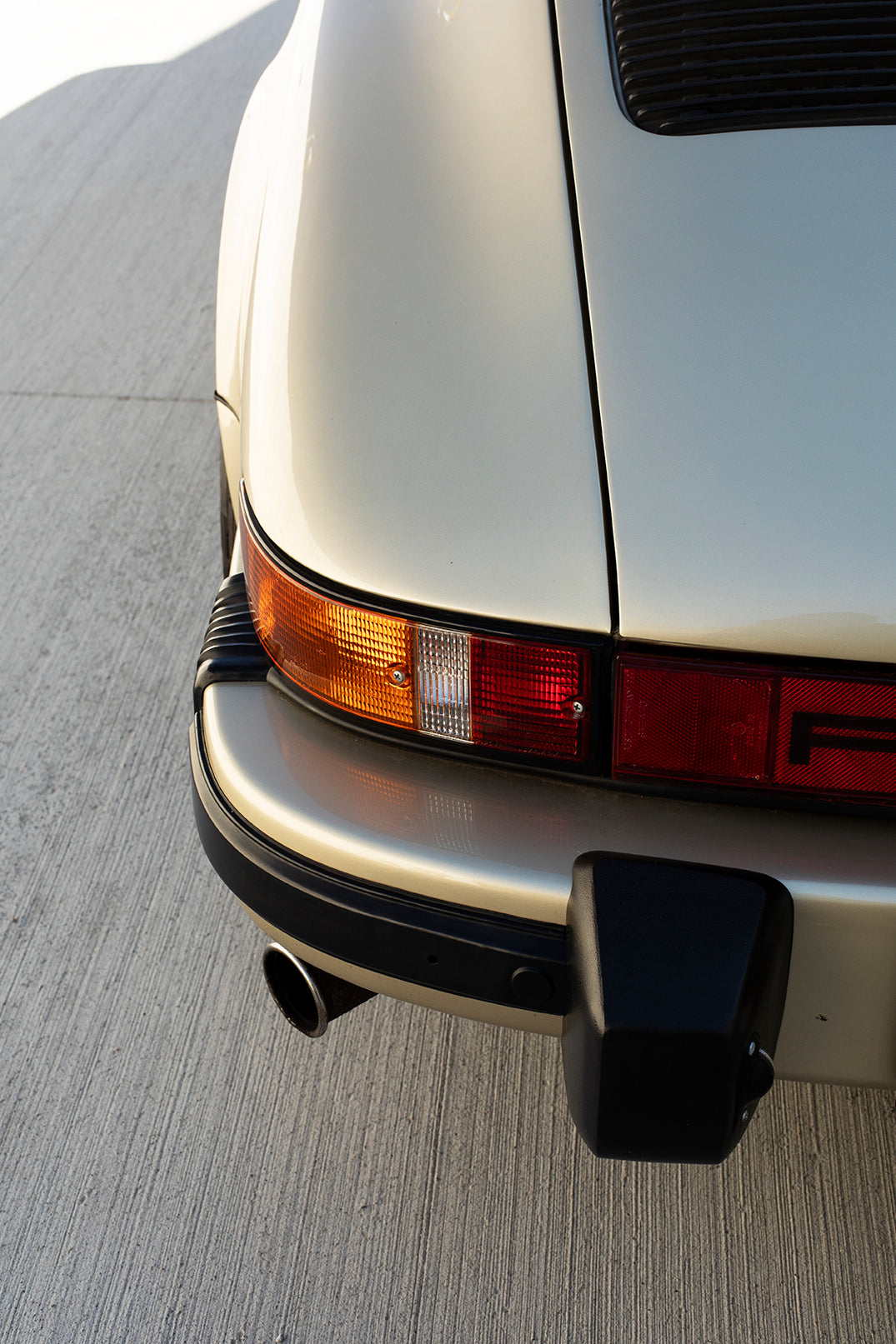 Rear light and bumper closeup. 1975 Porsche 911S Targa.