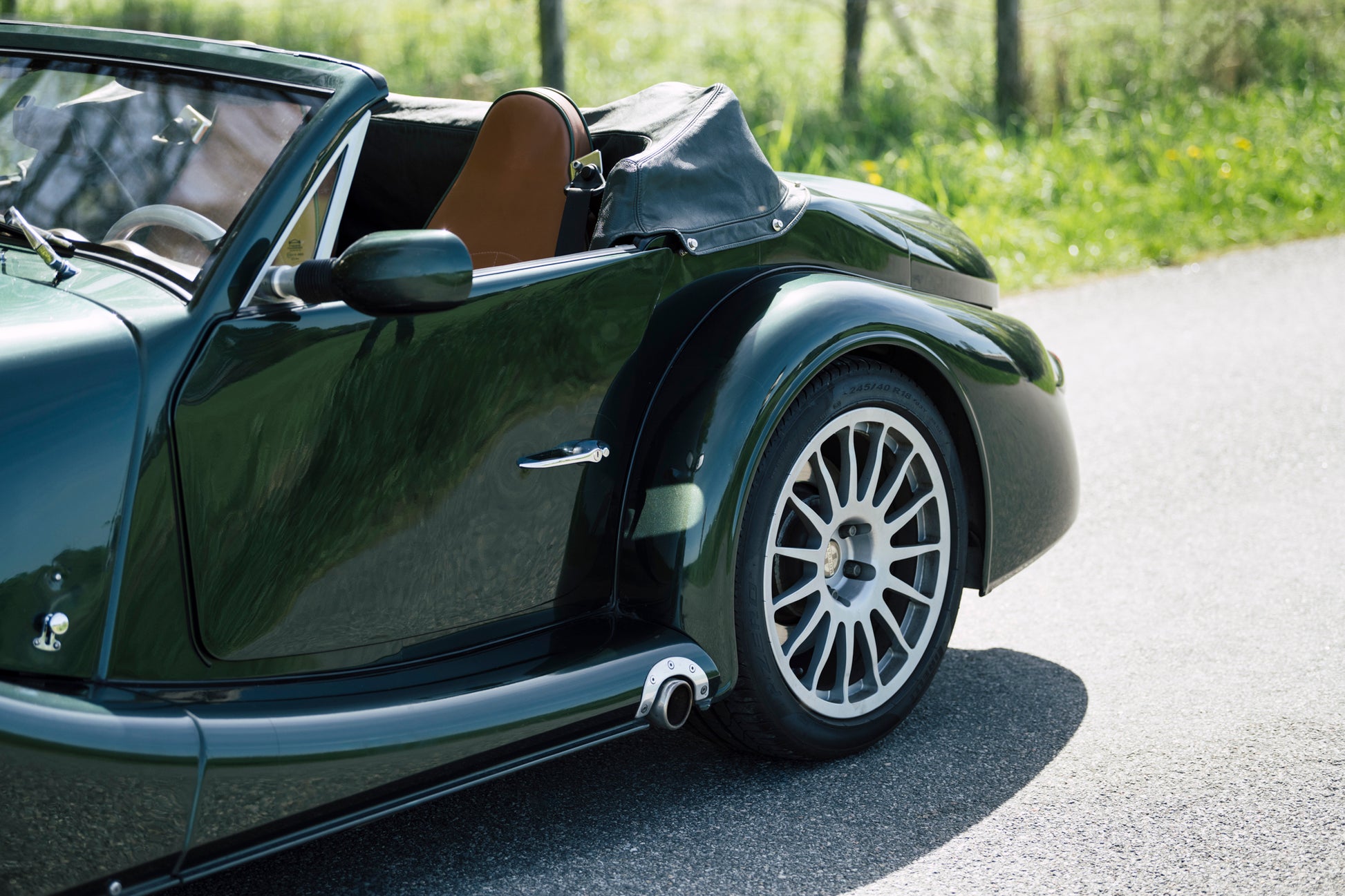 Door, wheel and exhaust. 2005 Morgan Aero 8.