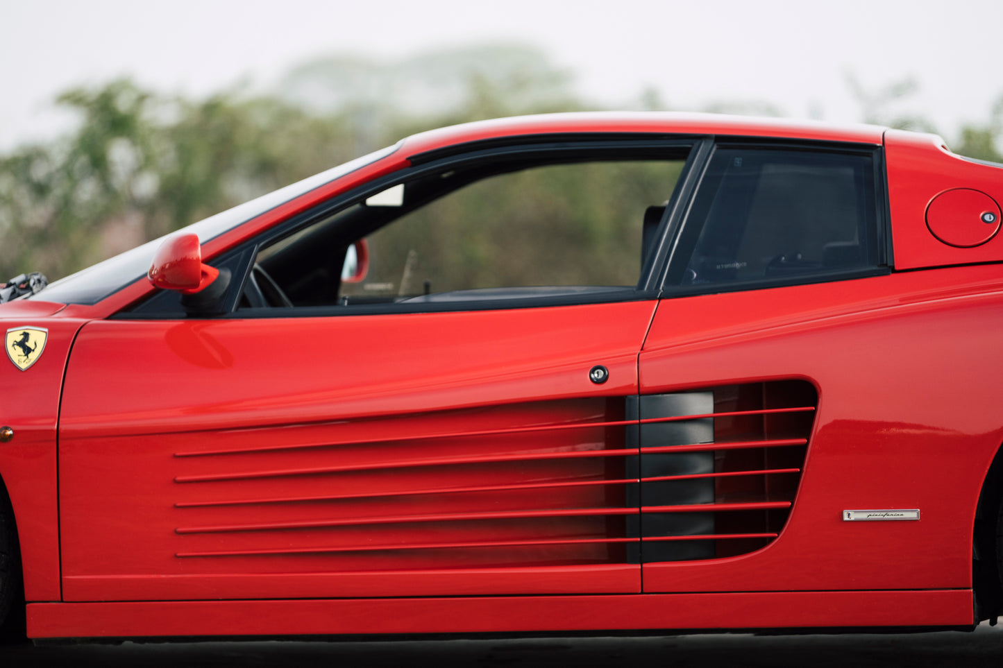 Cabin of a 1991 Ferrari Testarossa classic car.