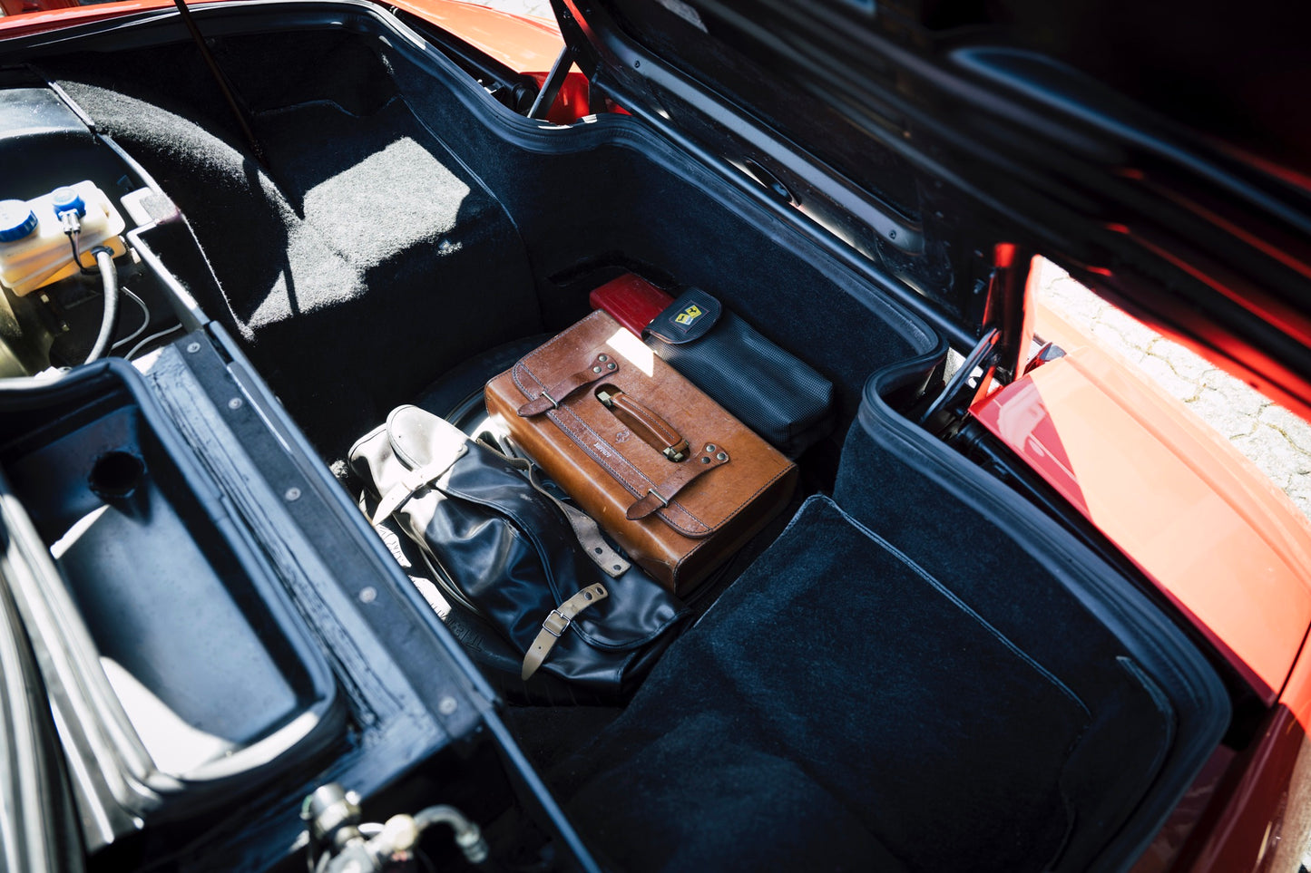 Tool bags. 1991 Ferrari Testarossa classic car.
