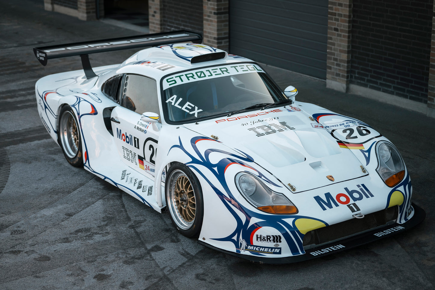 Lean 1997 Porsche 911 GT1 ready for race.