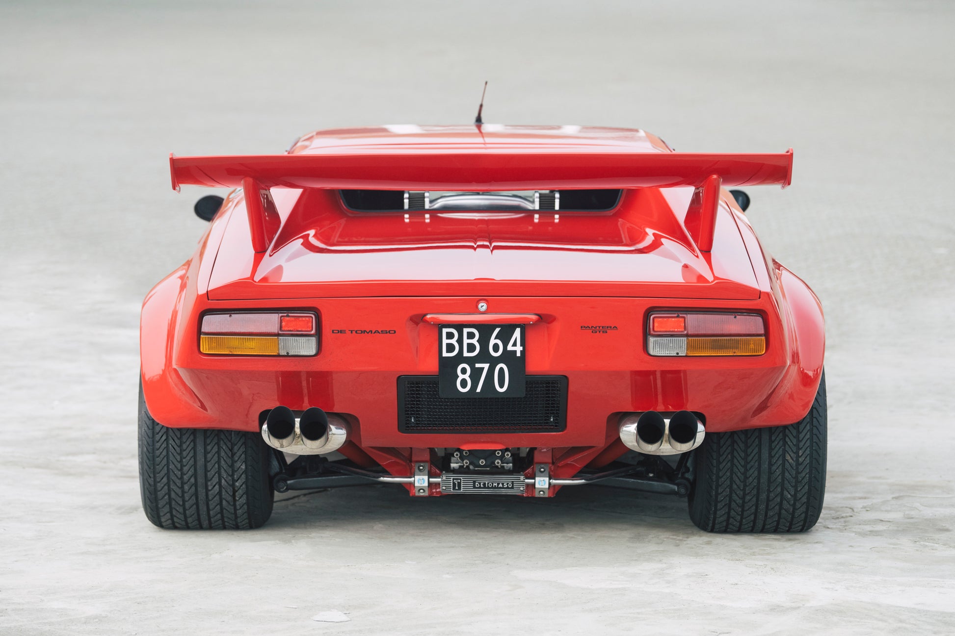 Broad tyres, spoiler and exhaust pipes. 1973 DeTomaso Pantera To GT5-S Specification.